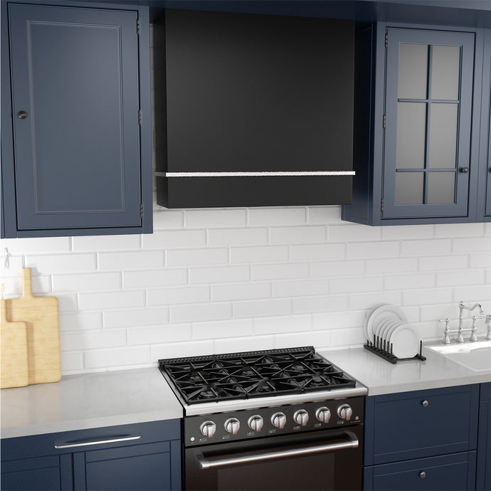 Modern kitchen with black stove, blue cabinets, and white tiled wall.