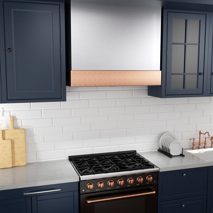 Modern kitchen with black stovetop and oven against a white tiled wall.