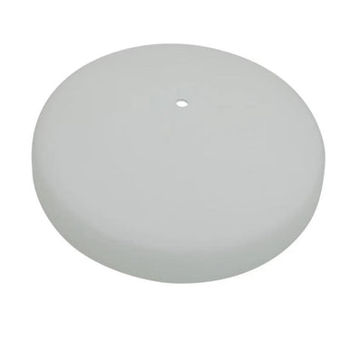 Round gray object with a small hole on a white background