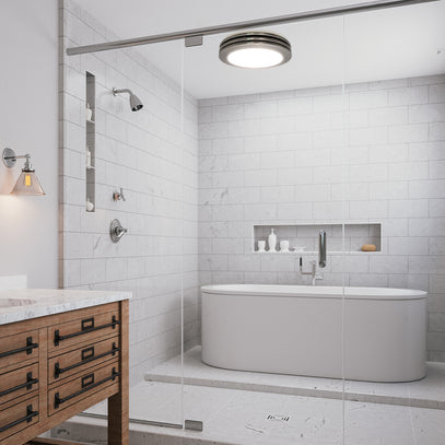 Modern bathroom with a freestanding bathtub, wooden vanity, and tiled walls.