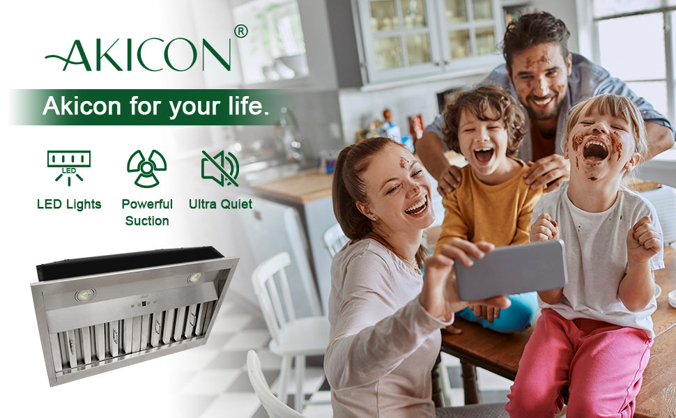 Family using a smartphone in a kitchen with an Akicon exhaust hood displayed.