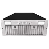 Stainless steel range hood with black glass panel on a white background