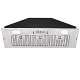 Stainless steel range hood with black top on a white background
