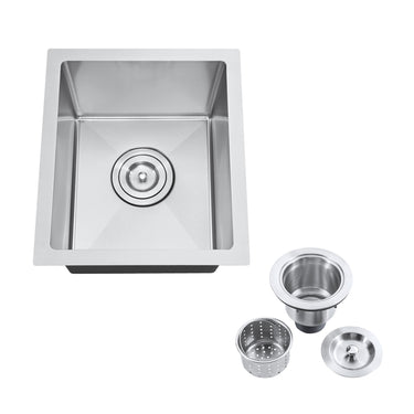 Stainless steel kitchen sink with accessories on a white background