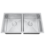 Stainless steel double basin kitchen sink on a white background