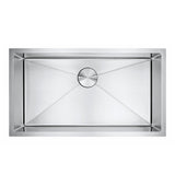 Stainless steel kitchen sink on a white background