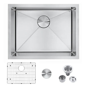 Stainless steel kitchen sink with accessories on a white background