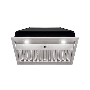 Stainless steel range hood with black top on a white background