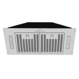 Stainless steel range hood with black glass panel on a white background