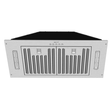 Stainless steel range hood with black glass panel on a white background