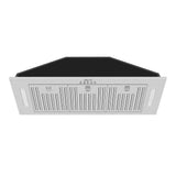 Stainless steel range hood on a white background