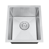 Stainless steel kitchen sink on a white background