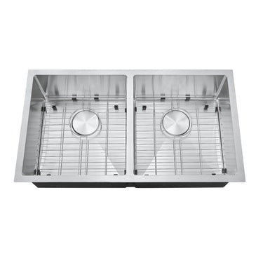 Stainless steel kitchen sink with grid on a white background