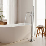 Modern freestanding bathtub with a chrome faucet in a bathroom setting.