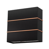Black wall-mounted shelf with copper accents on a white background