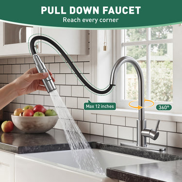 Kitchen faucet with pull-down spray head in a kitchen setting