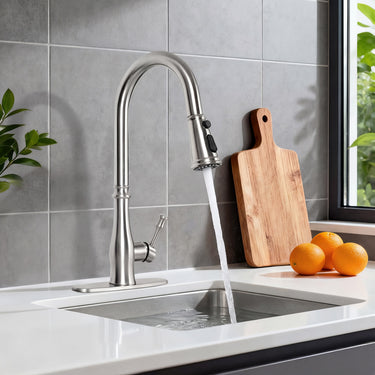 Modern kitchen sink with running water, wooden cutting board, and oranges on a gray tiled wall.