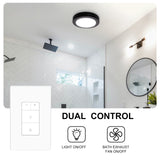 Bathroom interior with dual control light and exhaust fan switch, featuring a modern shower setup.