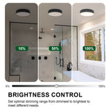 Bathroom scene with three different brightness levels indicated by green bars, showing a 10%, 50%, and 100% setting.