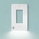 White light switch on a light blue wall