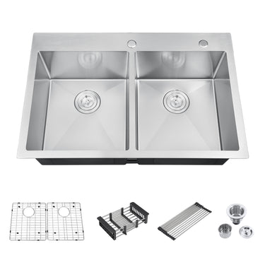 Stainless steel kitchen sink with accessories on a white background