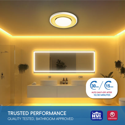 Bathroom with a ceiling light fixture and a large mirror, featuring certification logos at the bottom.
