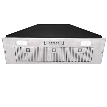 Stainless steel range hood with black top on a white background