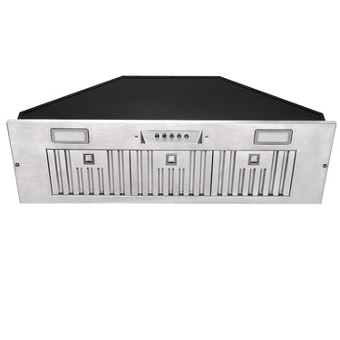 Stainless steel range hood with black top on a white background