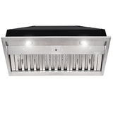 Stainless steel range hood with black top on a white background