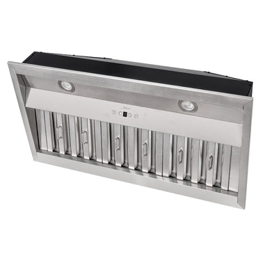 Stainless steel range hood on a white background
