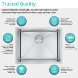 Stainless steel sink with features highlighted on a white background