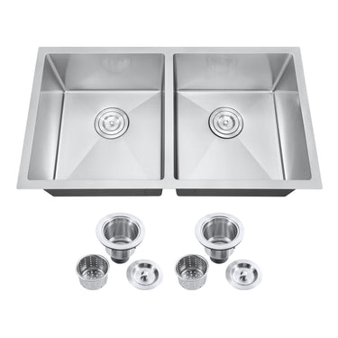 Stainless steel kitchen sink with drainboards and accessories on a white background