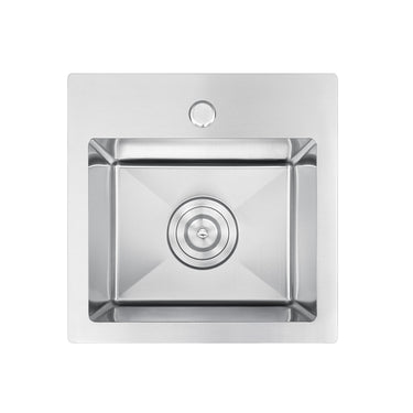 Stainless steel kitchen sink on a white background