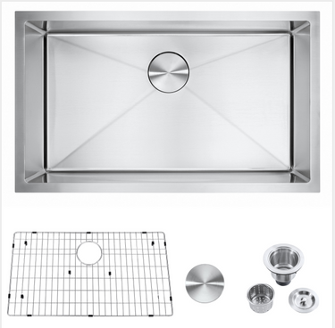 Stainless steel kitchen sink set with components on a white backgroun