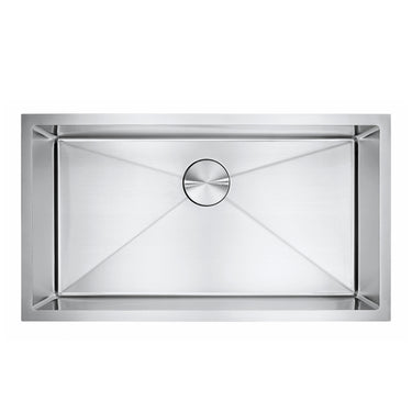 Stainless steel kitchen sink on a white background