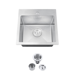 Stainless steel kitchen sink with drain components on a white background