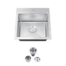 Stainless steel kitchen sink with drain components on a white background