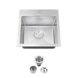 Stainless steel kitchen sink with drain components on a white background