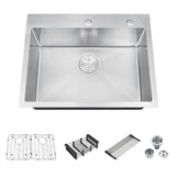 Stainless steel kitchen sink with accessories on a white background