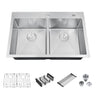 Stainless steel kitchen sink with accessories on a white background