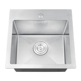 Stainless steel kitchen sink on a white background