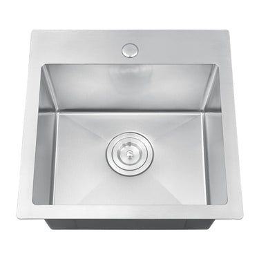 Stainless steel kitchen sink on a white background