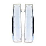 Pair of white shin guards with black accents on a white background